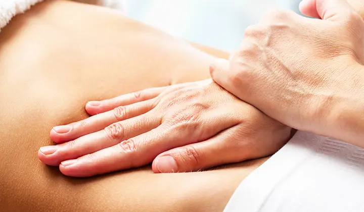 Massage bei Regelschmerzen